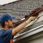 a painter painting roof gutters